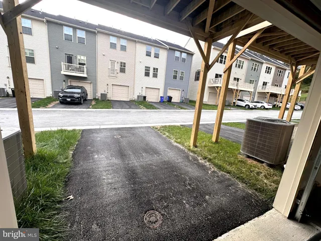 a view of a back yard of the house