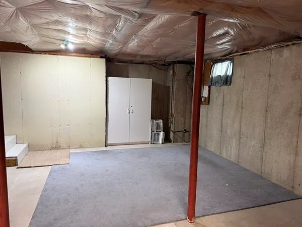 a view of a room with a fireplace
