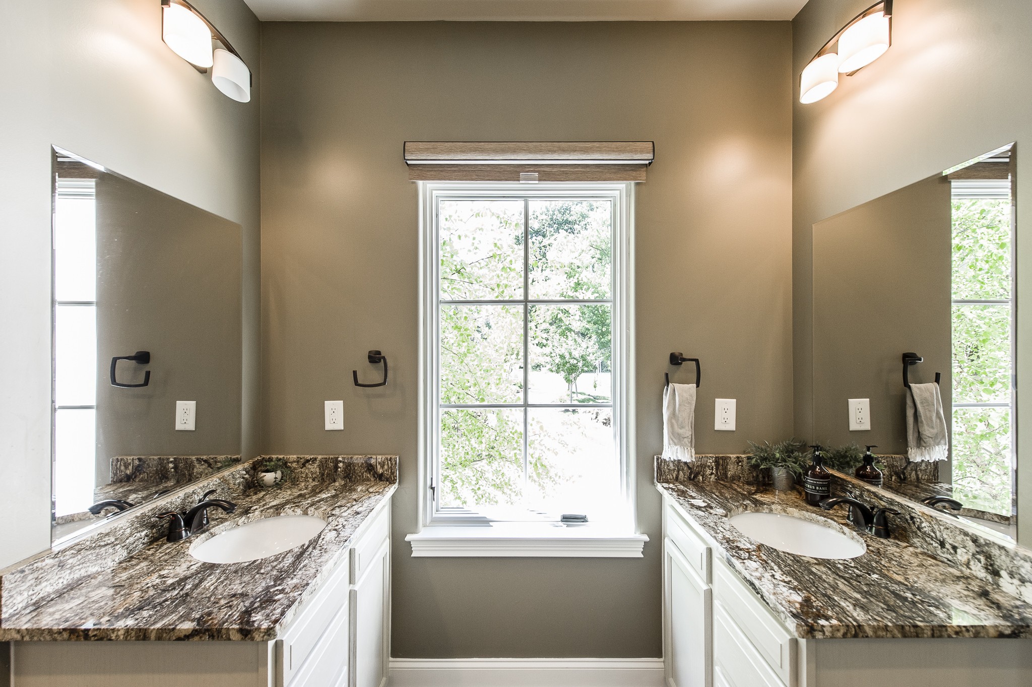 817 Burton Point Road Mount Juliet, TN 37122 - Photo 23 of 41 a bathroom with a granite countertop sink and a mirror