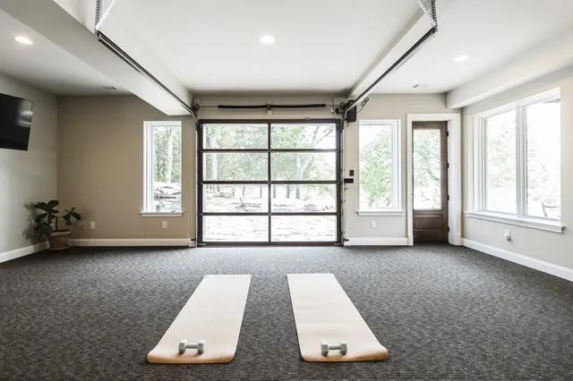 a view of a room with window and a couch