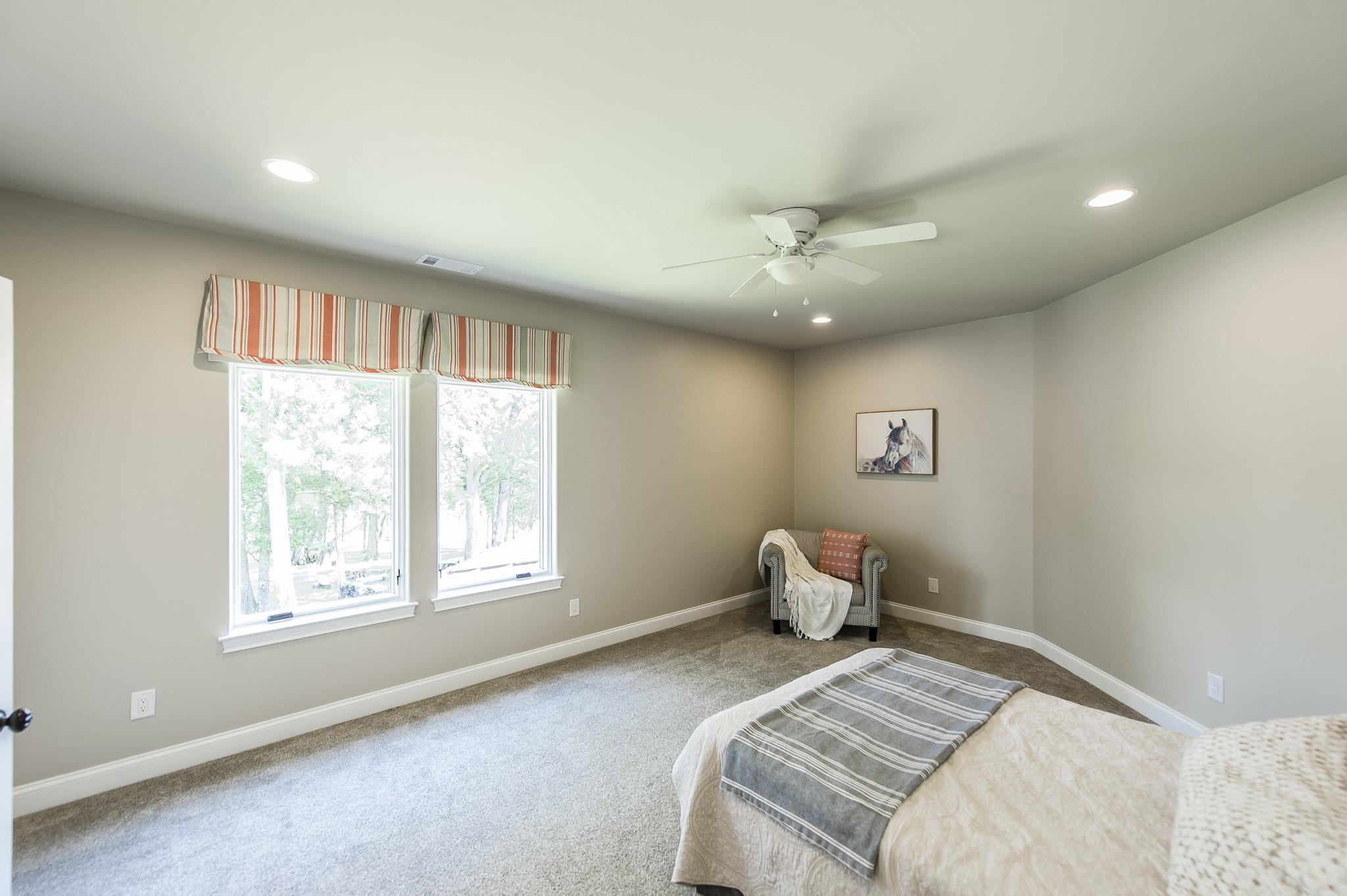 817 Burton Point Road Mount Juliet, TN 37122 - Photo 28 of 41 a bedroom with a bed and a window