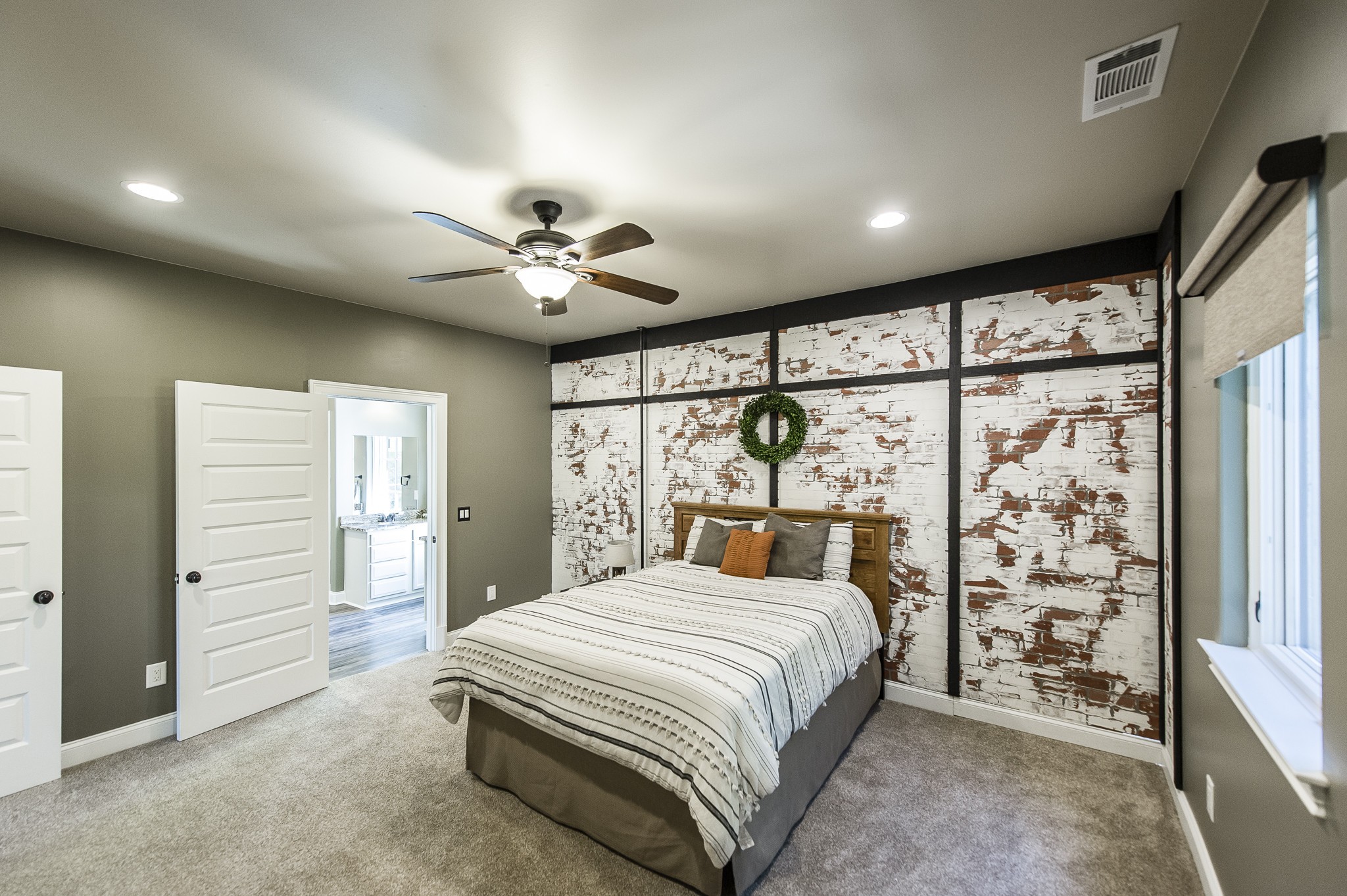 817 Burton Point Road Mount Juliet, TN 37122 - Photo 30 of 41 a bedroom with a large bed and a large window