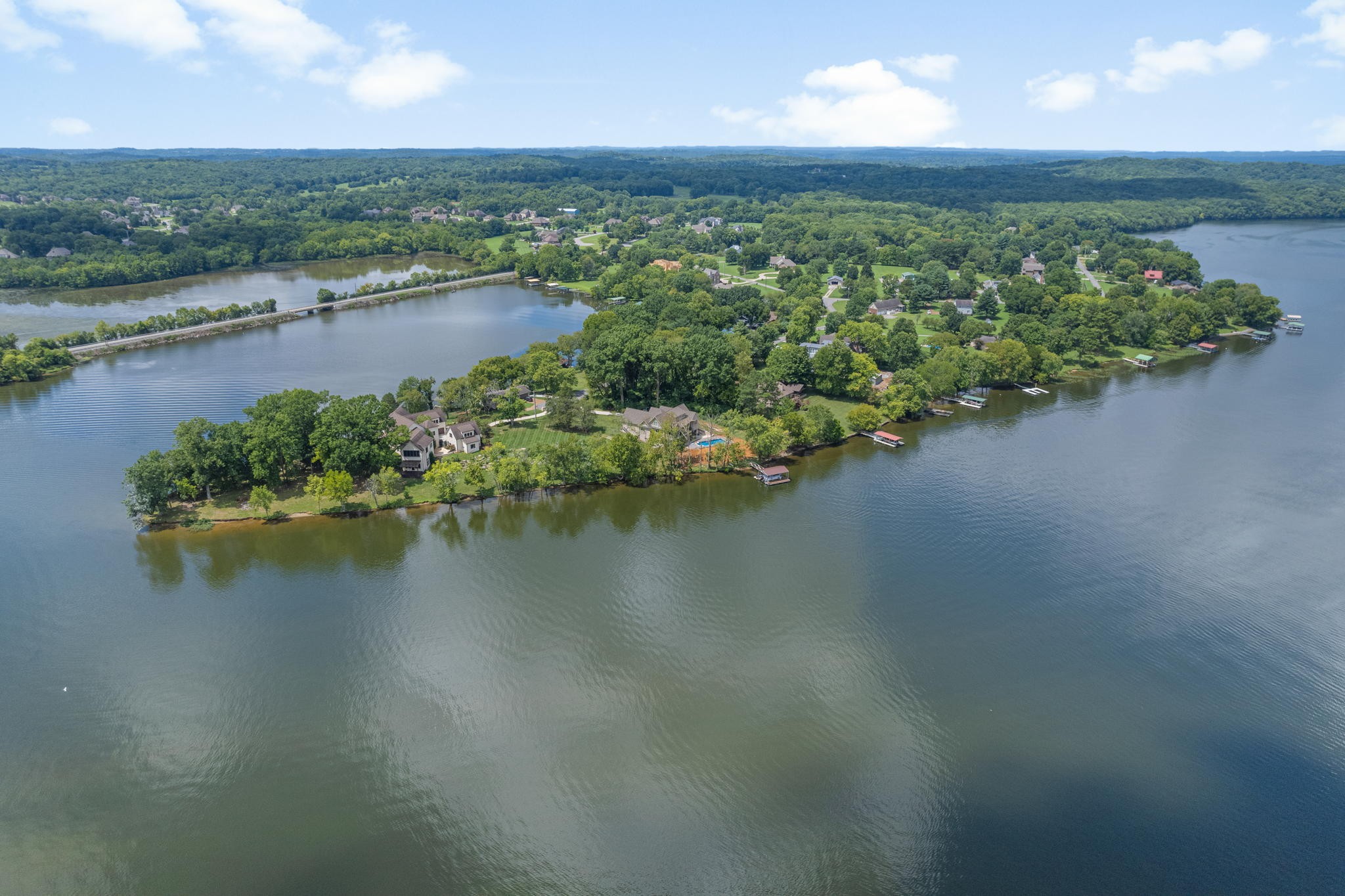 817 Burton Point Road Mount Juliet, TN 37122 - Photo 32 of 41 an aerial view of ocean with residential house with outdoor space and trees around