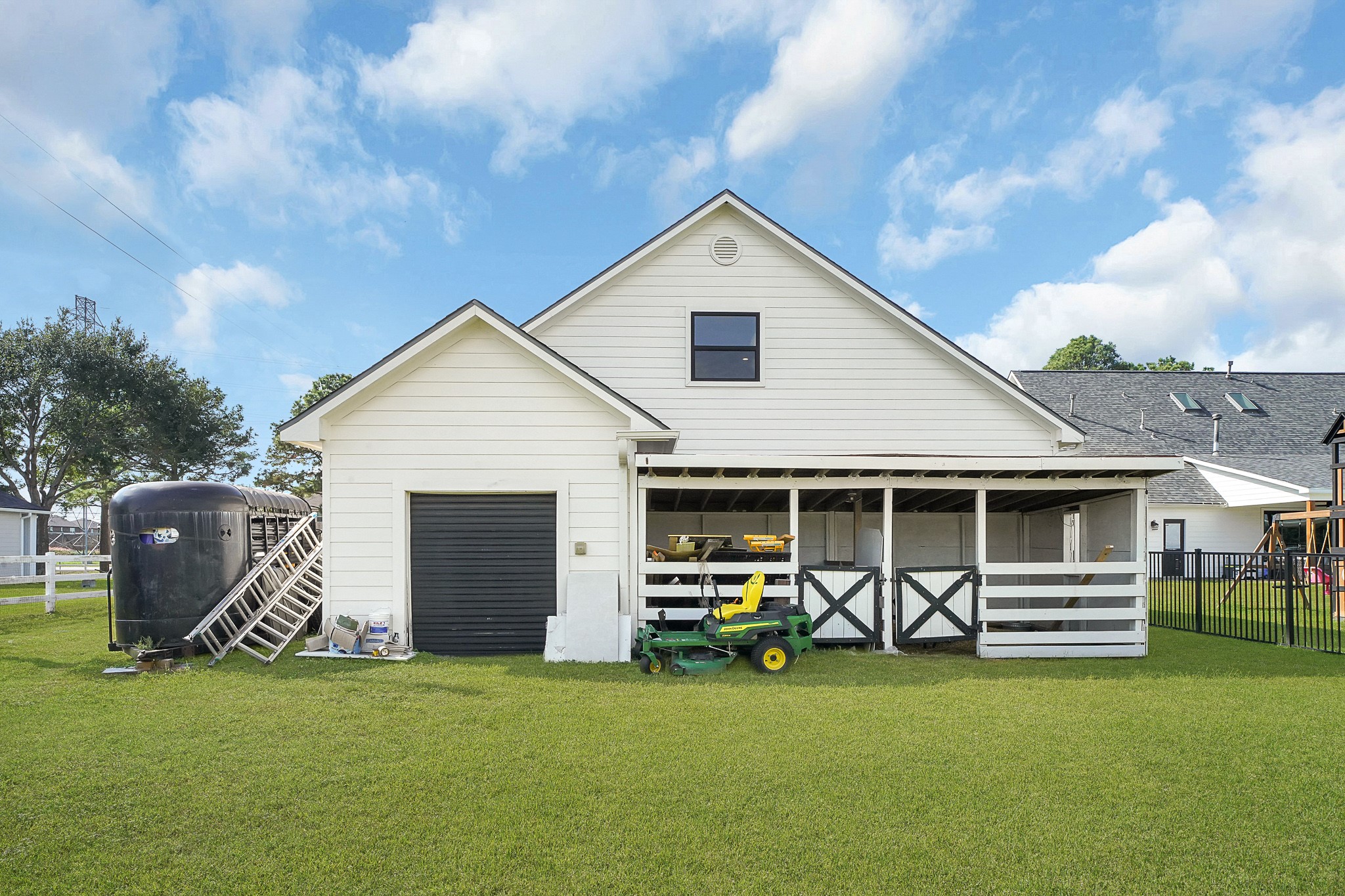 4730 Pitts Road Katy, TX 77493 - Photo 27 of 36 Barn Stall and Golf cart garage/Tractor.