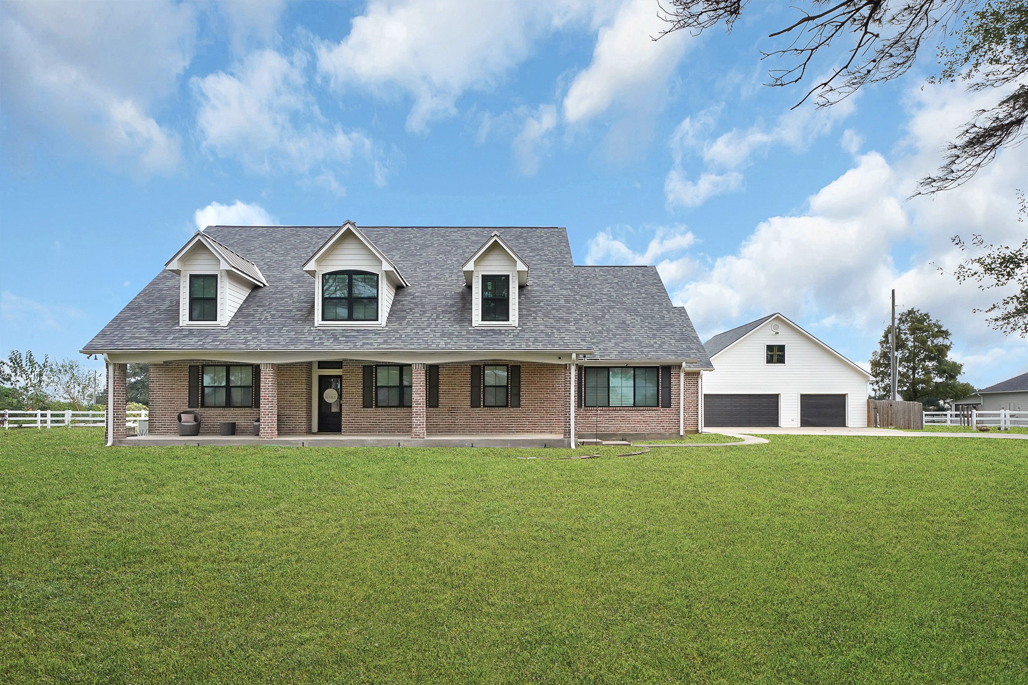 4730 Pitts Road Katy, TX 77493 - Photo 34 of 36 Ranch-style home featuring a detached three-car garage and an extended driveway