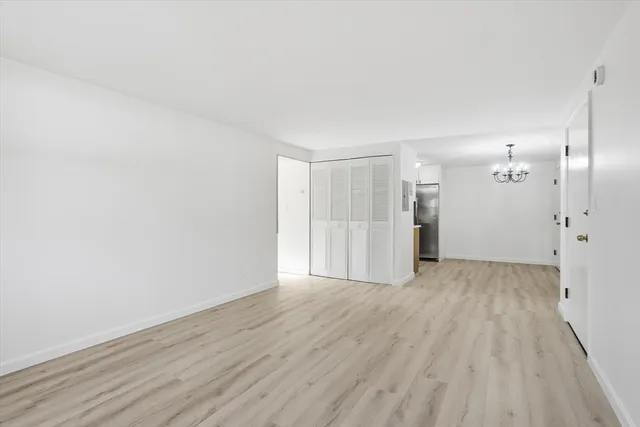 a view of a livingroom with wooden floor