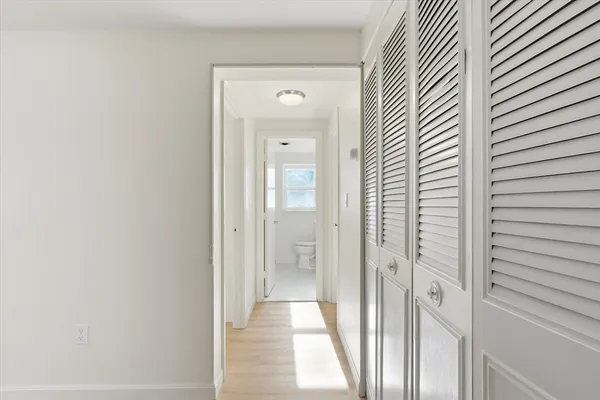 a view of a bathroom from a hallway