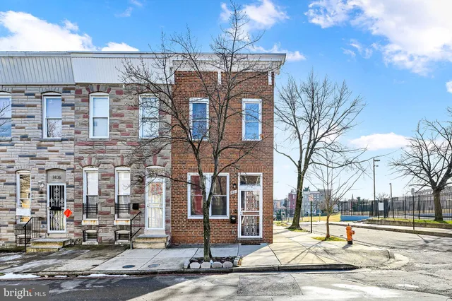 a front view of a building with street view