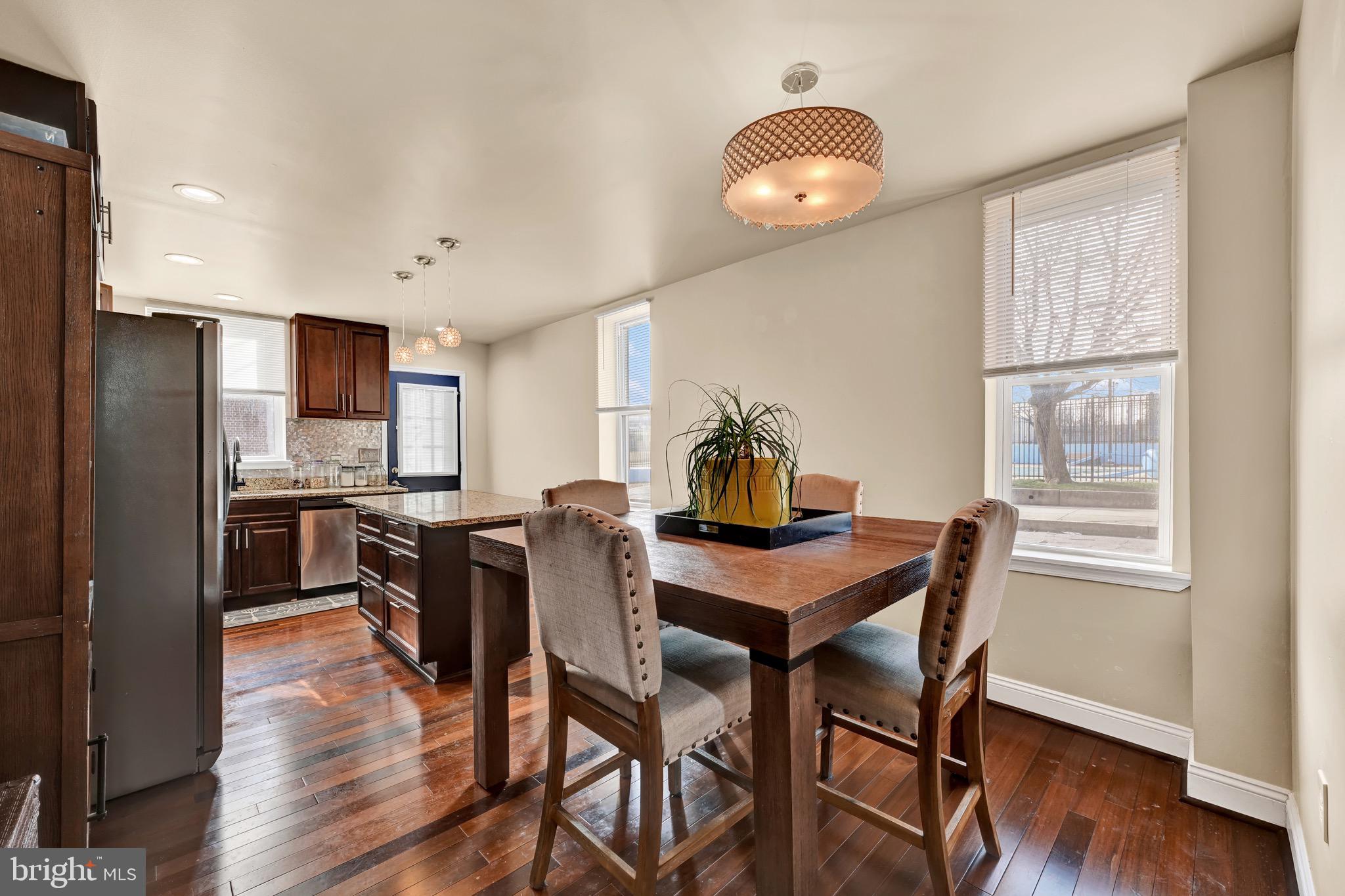 1401 East Lanvale Street Baltimore, MD 21213 - Photo 6 of 17 a view of a dining room with furniture and wooden floor