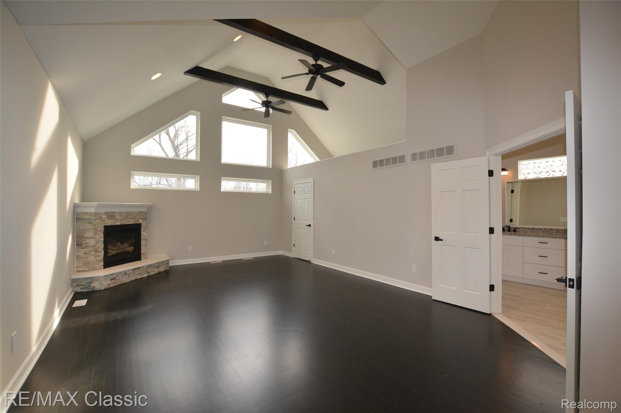 321 Leon Road Walled Lake, MI 48390 - Photo 25 of 53 Master Suite w/Gas Fireplace