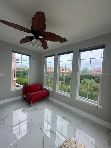 a bedroom with bed and wooden floor