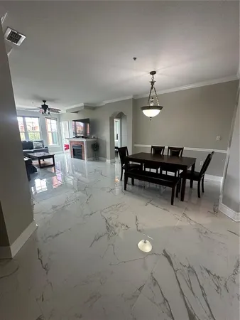 a view of a livingroom with furniture and window
