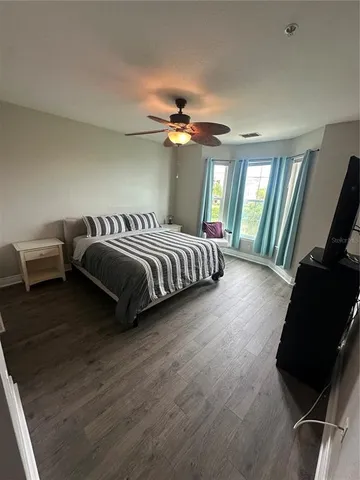 a large bathroom with a double vanity sink a mirror and a shower