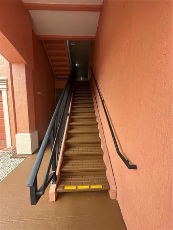 a view of a hall with a front door
