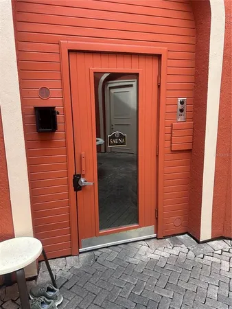 a swimming pool with some trees in the background