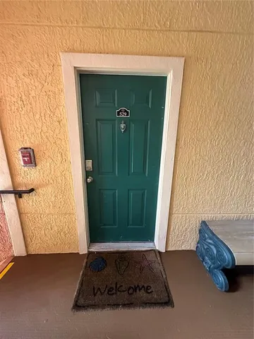 a view of a livingroom with a bench