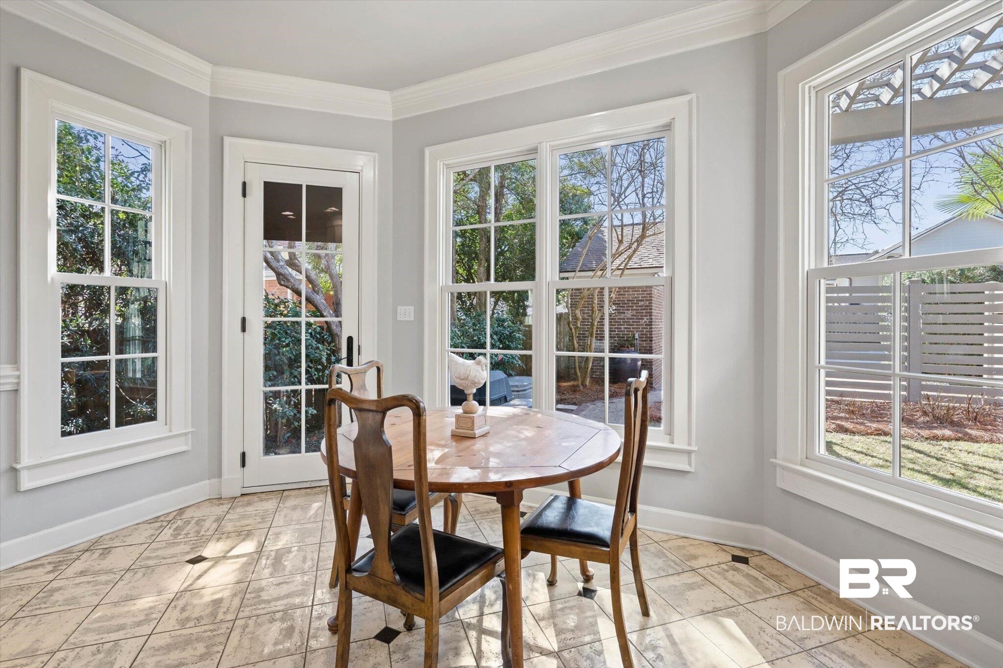 3615 Stein Street Mobile, AL 36608 - Photo 14 of 44 Dining space featuring crown molding and baseboards