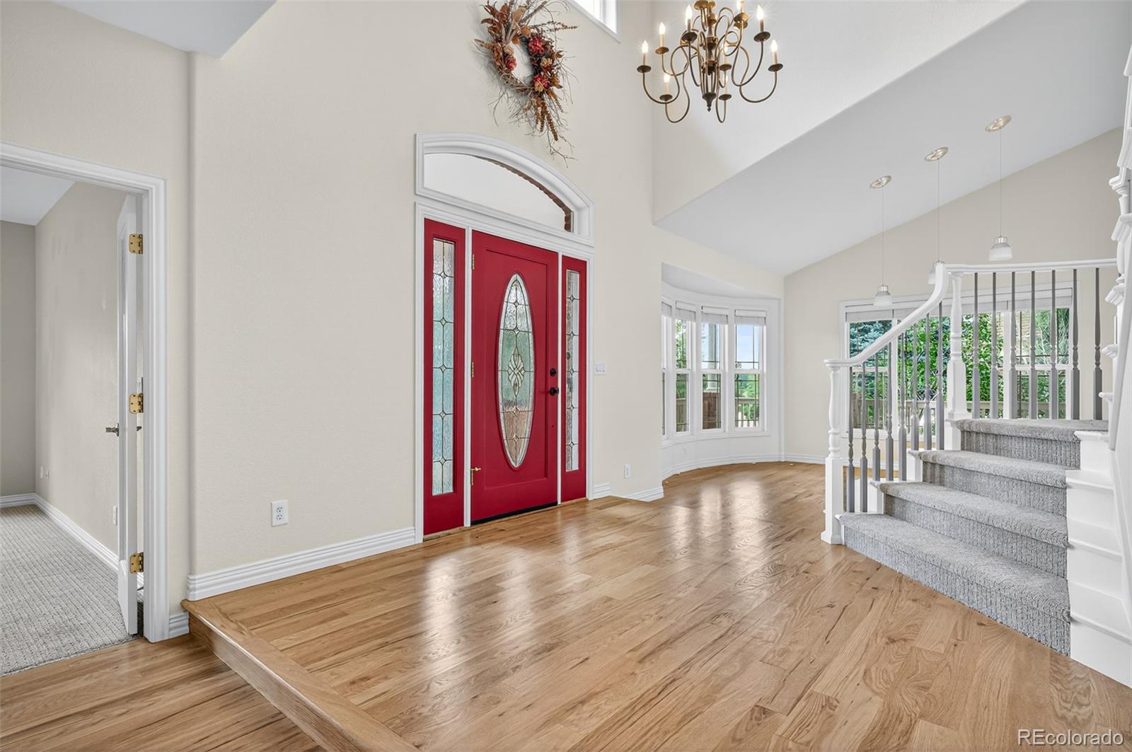 8389 Owl Roost Court Parker, CO 80134 - Photo 15 of 50 a view of entryway with wooden floor