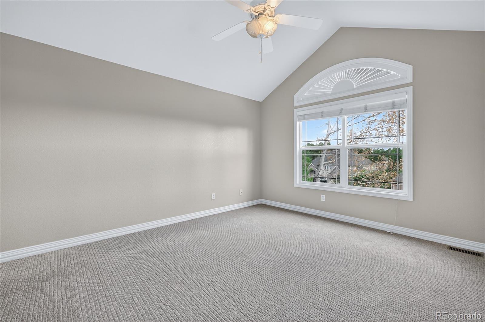 8389 Owl Roost Court Parker, CO 80134 - Photo 46 of 50 an empty room with windows