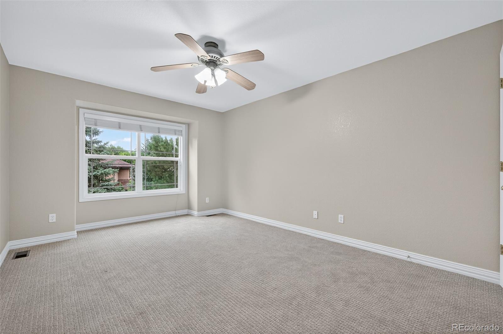 8389 Owl Roost Court Parker, CO 80134 - Photo 48 of 50 a view of an empty room with a window