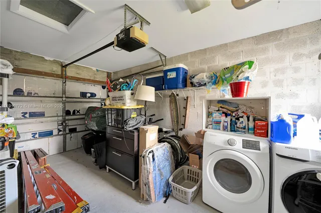 a storage room with washer and dryer