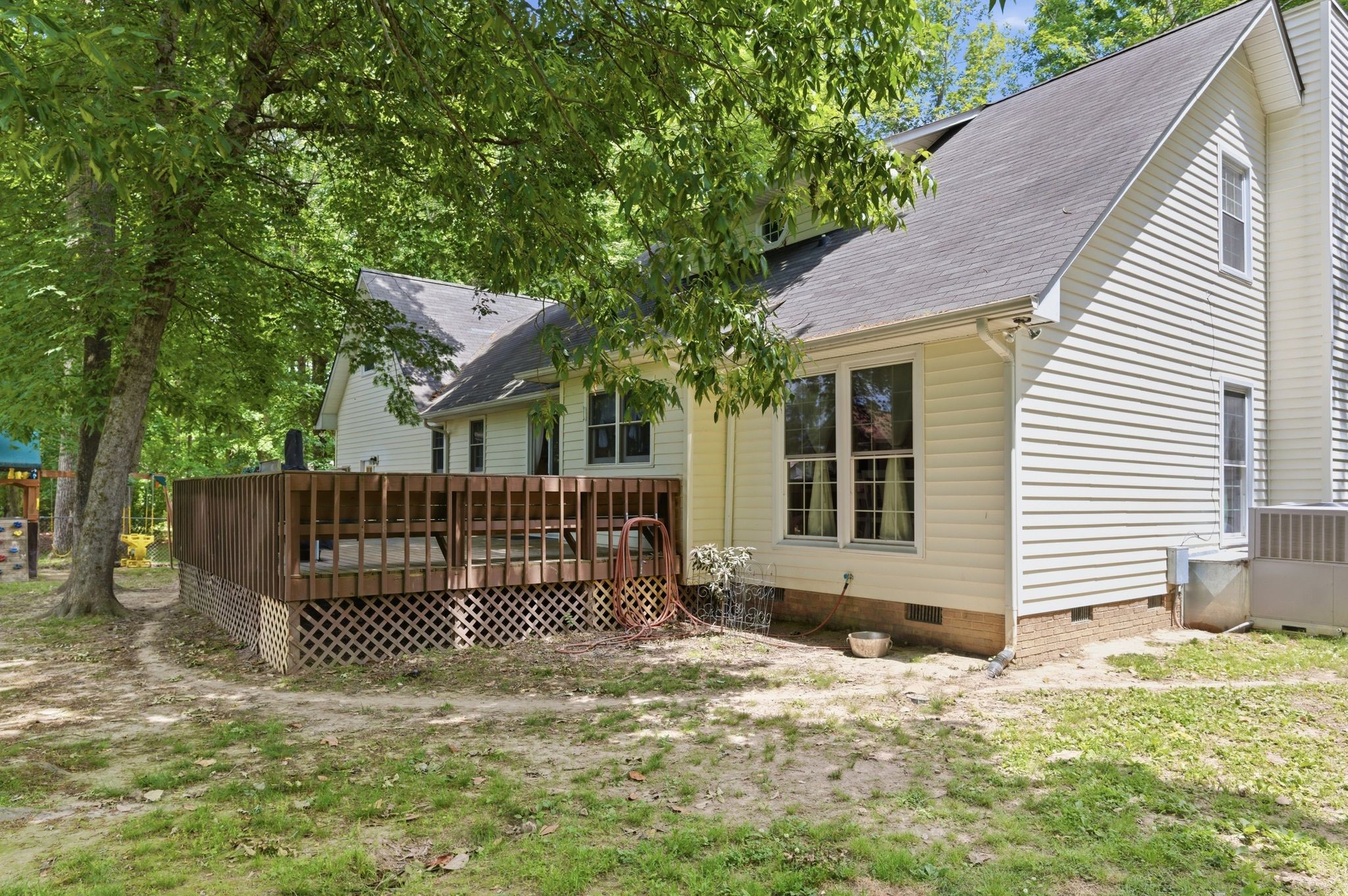 99 Smoke Rise Circle Manchester, TN 37355 - Photo 40 of 45 a view of a house with a small yard and wooden fence