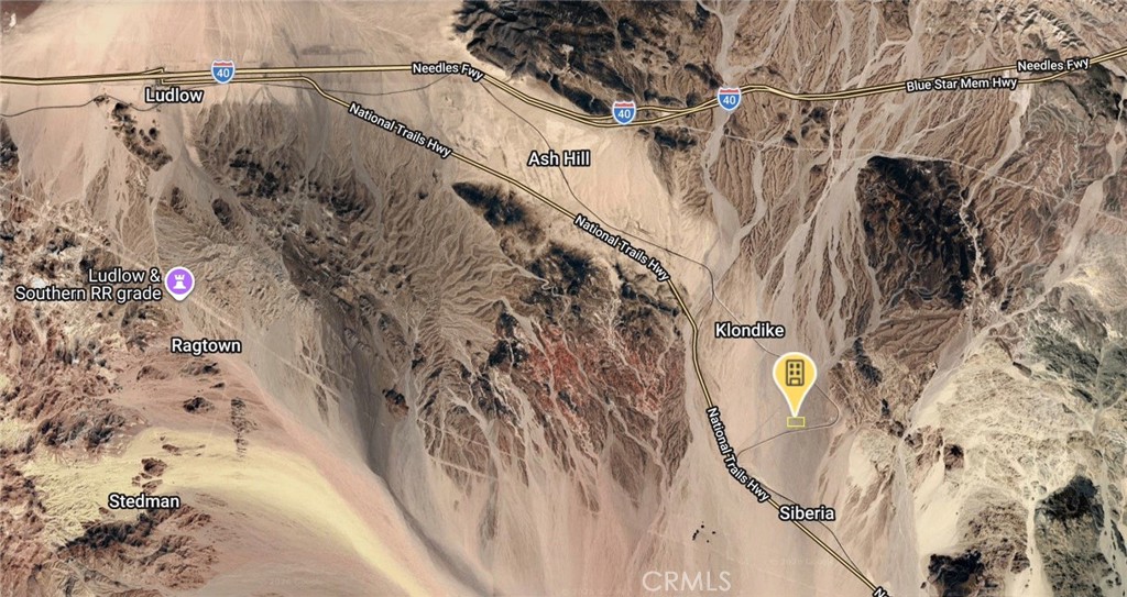 0 Klondike Road Amboy, CA 92304 - Photo 6 of 7 a view of a yard with a tree