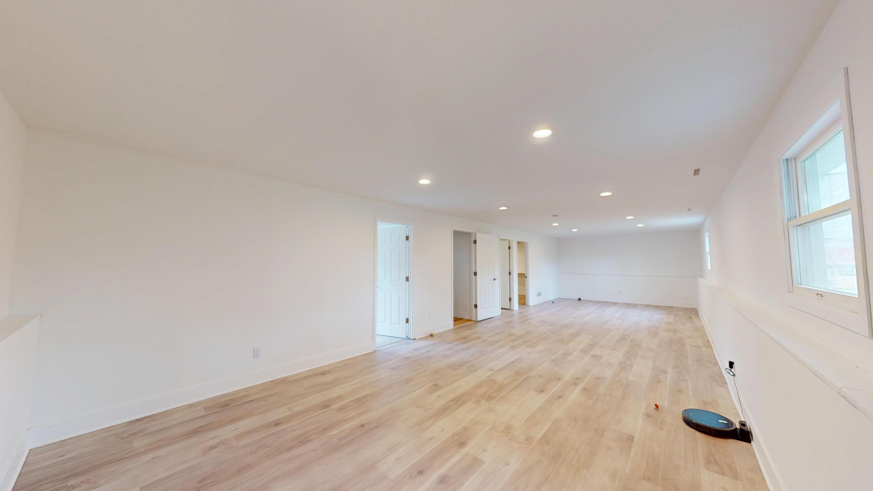 3064 Parkwood Place Crown Point, IN 46307 - Photo 23 of 40 a view of an empty room with wooden floor and a window