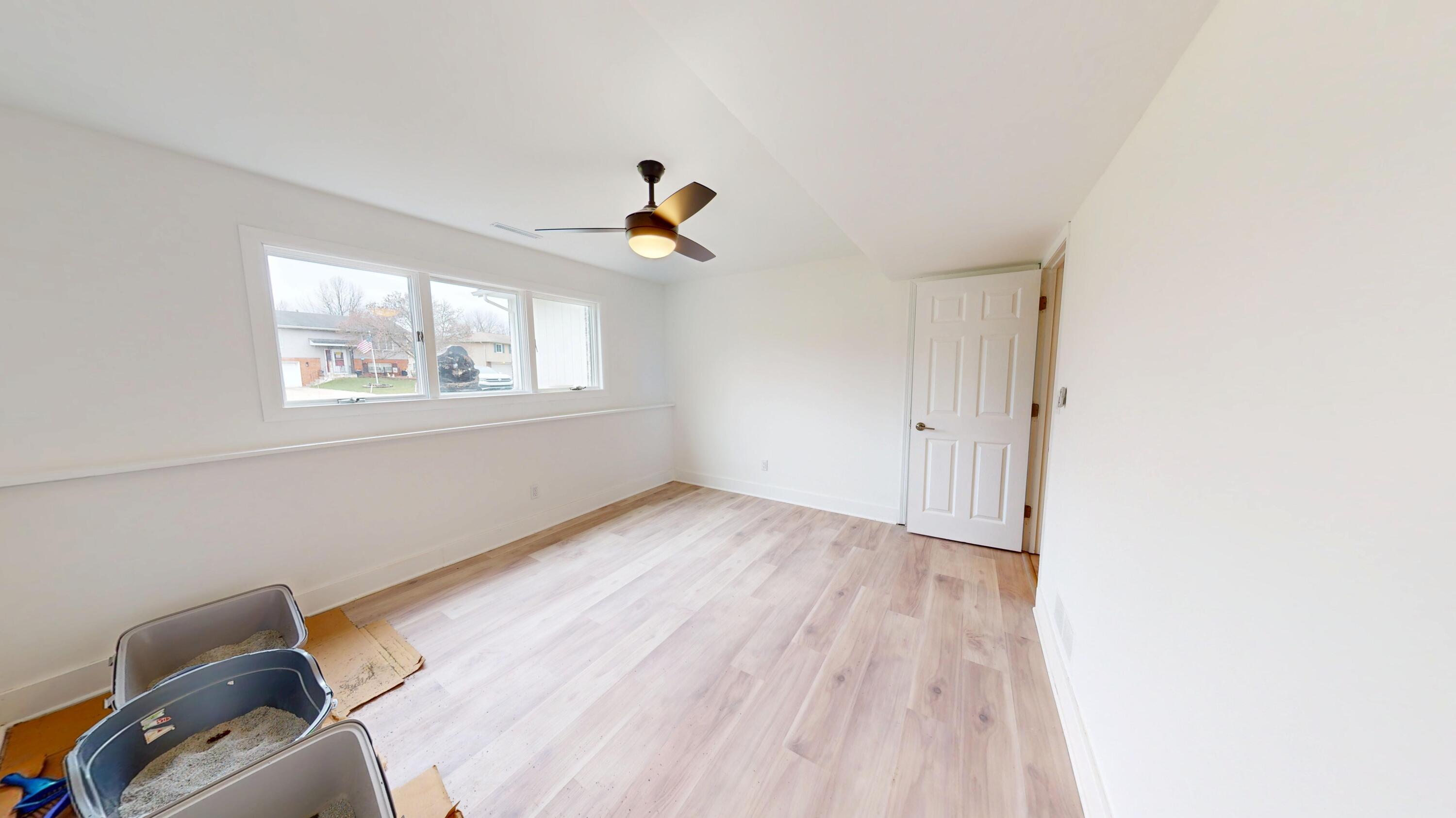 3064 Parkwood Place Crown Point, IN 46307 - Photo 28 of 40 a view of room with hardwood floor and window