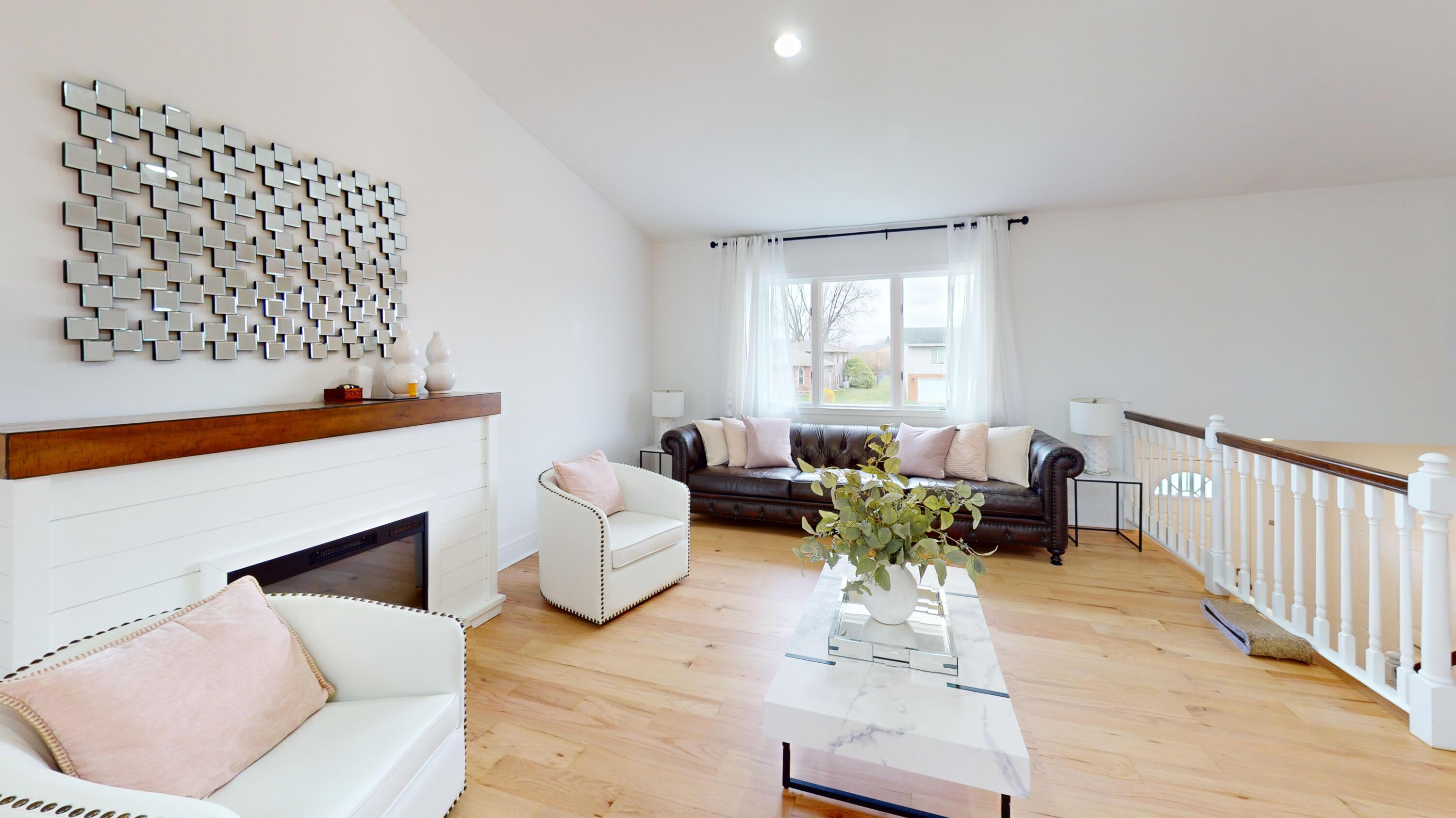 3064 Parkwood Place Crown Point, IN 46307 - Photo 3 of 40 a living room with furniture lamp and a potted plant