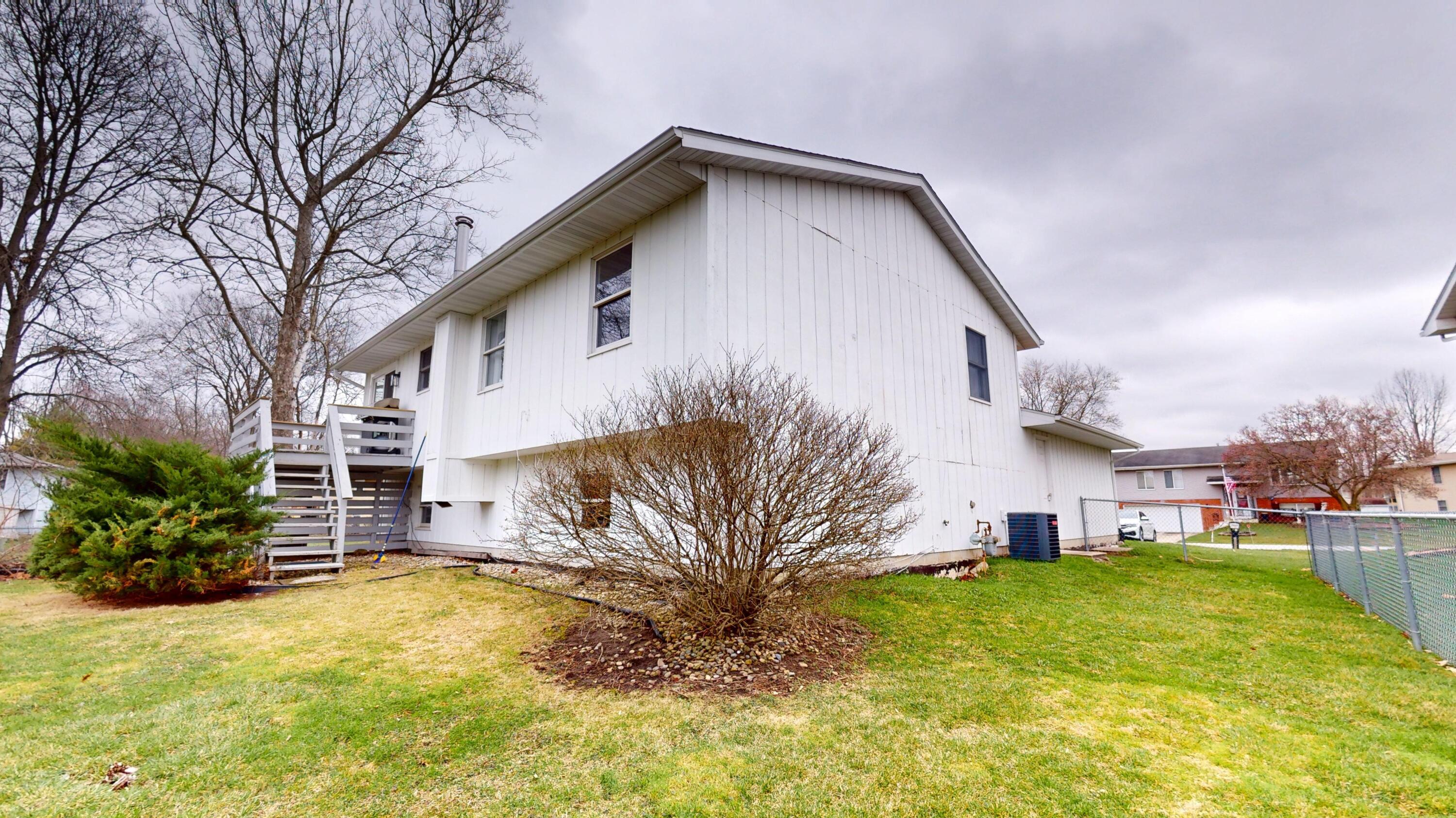 3064 Parkwood Place Crown Point, IN 46307 - Photo 39 of 40 a view of a house with a yard