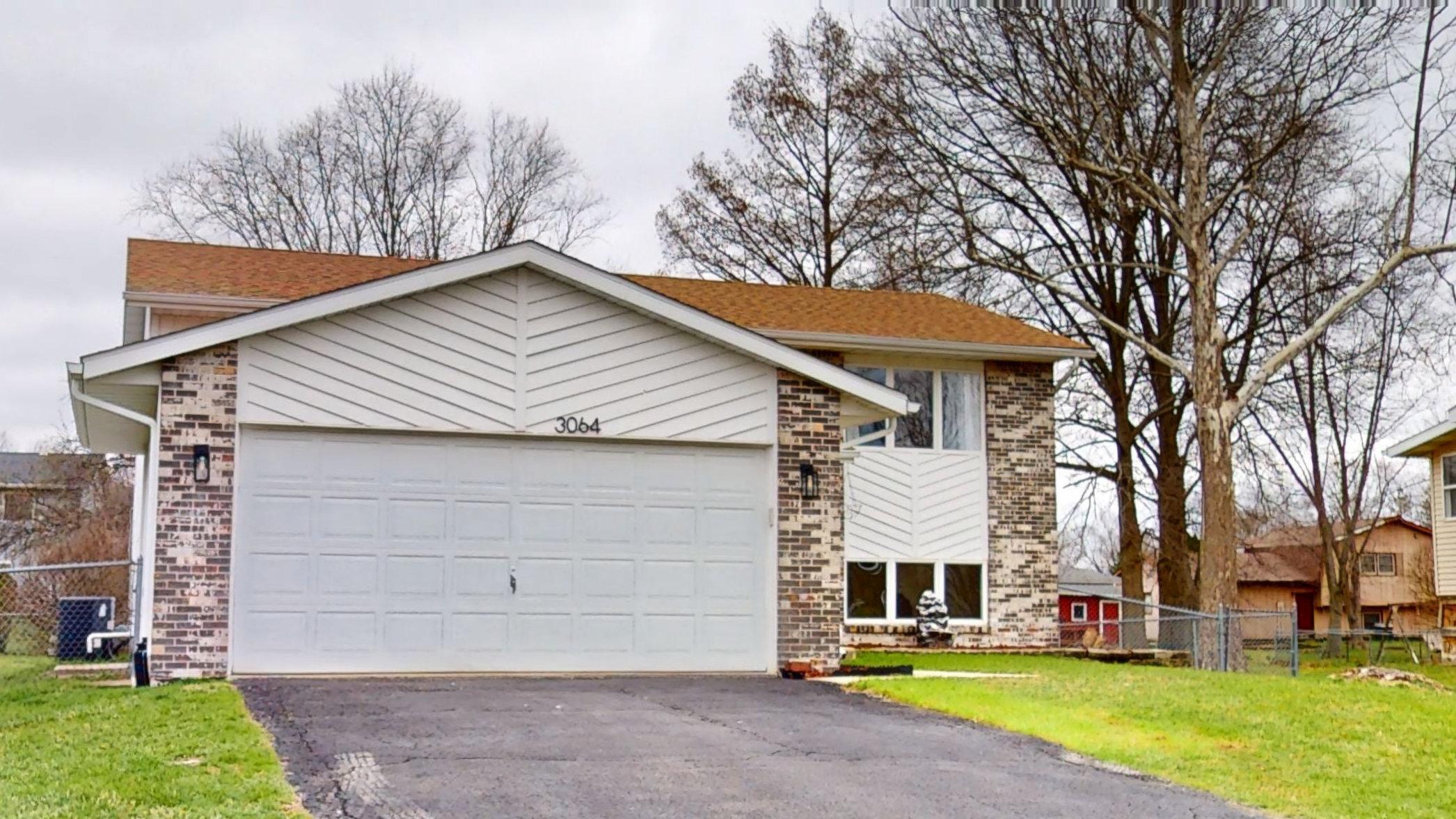 3064 Parkwood Place Crown Point, IN 46307 - Photo 40 of 40 a front view of a house with a yard