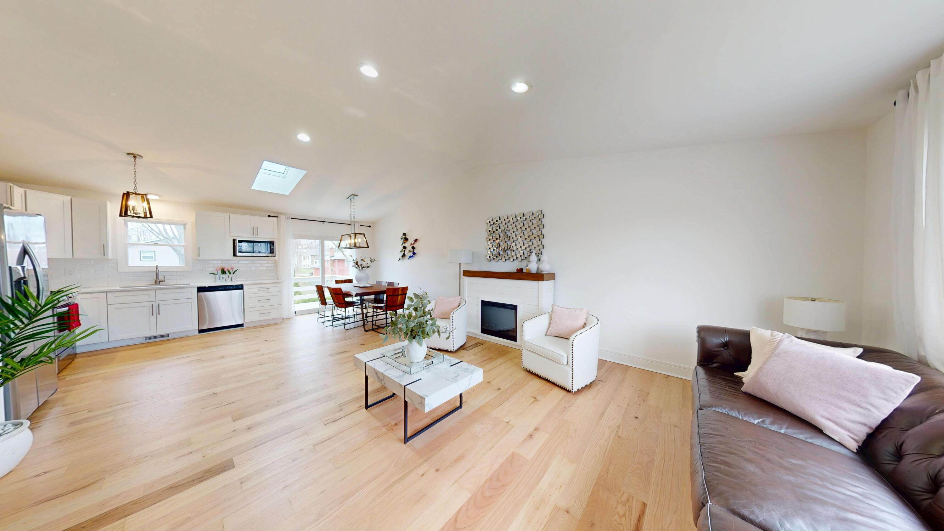 3064 Parkwood Place Crown Point, IN 46307 - Photo 4 of 40 a living room with furniture and a wooden floor