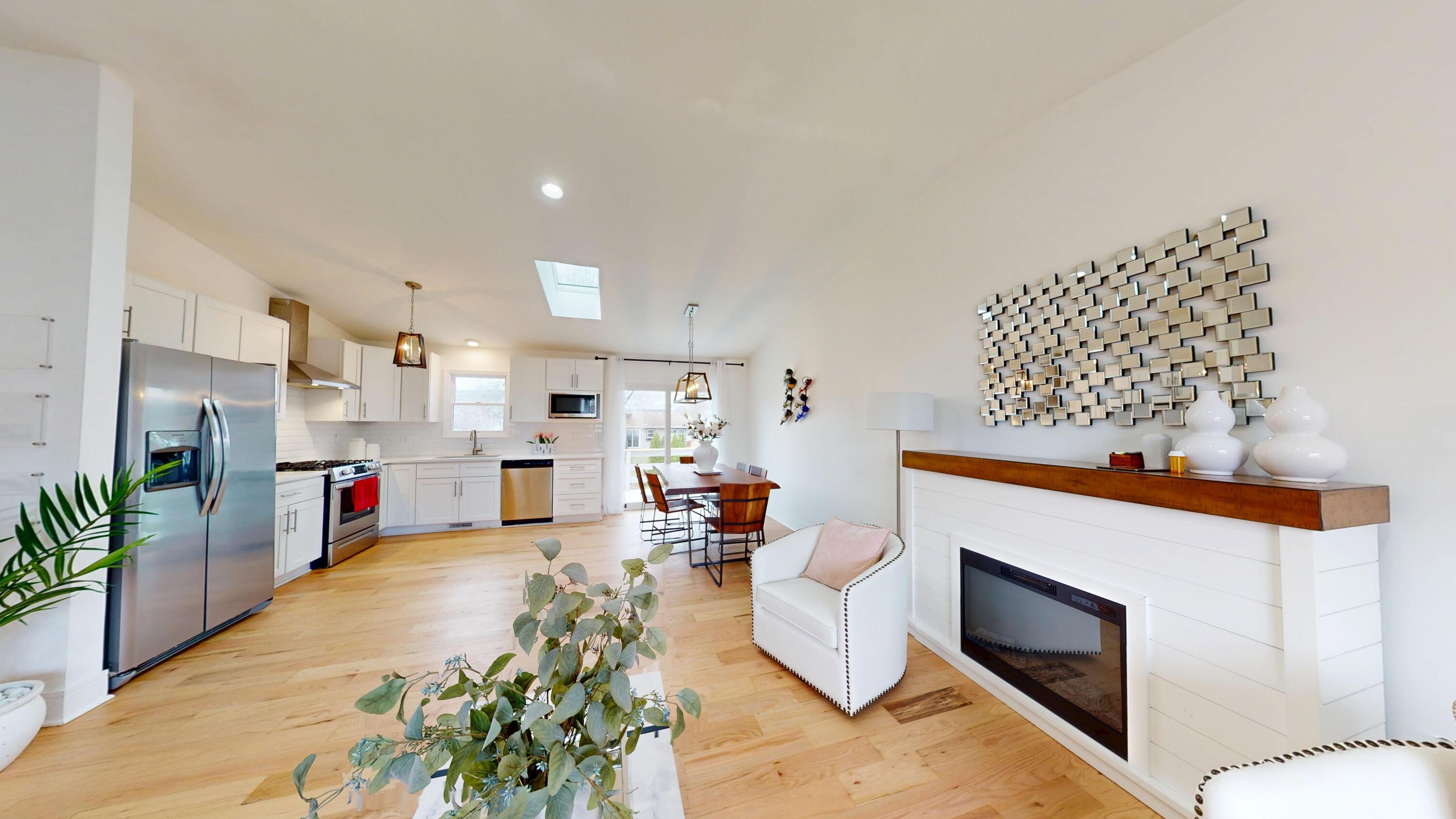 3064 Parkwood Place Crown Point, IN 46307 - Photo 6 of 40 a living room with furniture and a fireplace