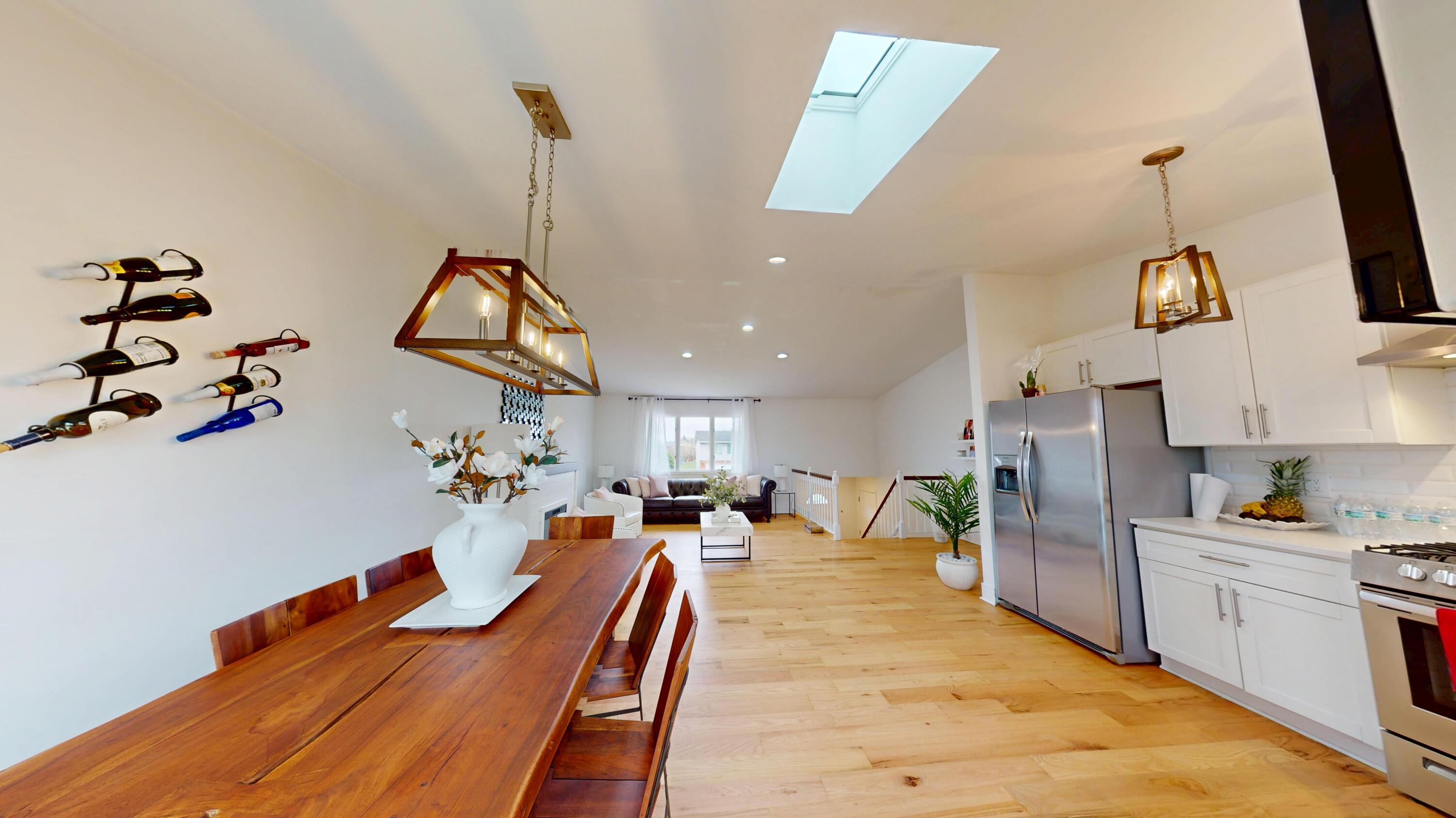3064 Parkwood Place Crown Point, IN 46307 - Photo 8 of 40 a view of a kitchen and dining room