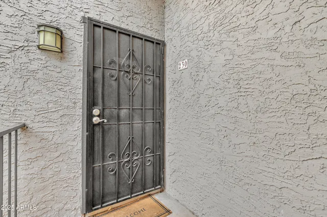 a bathroom with a shower and a door