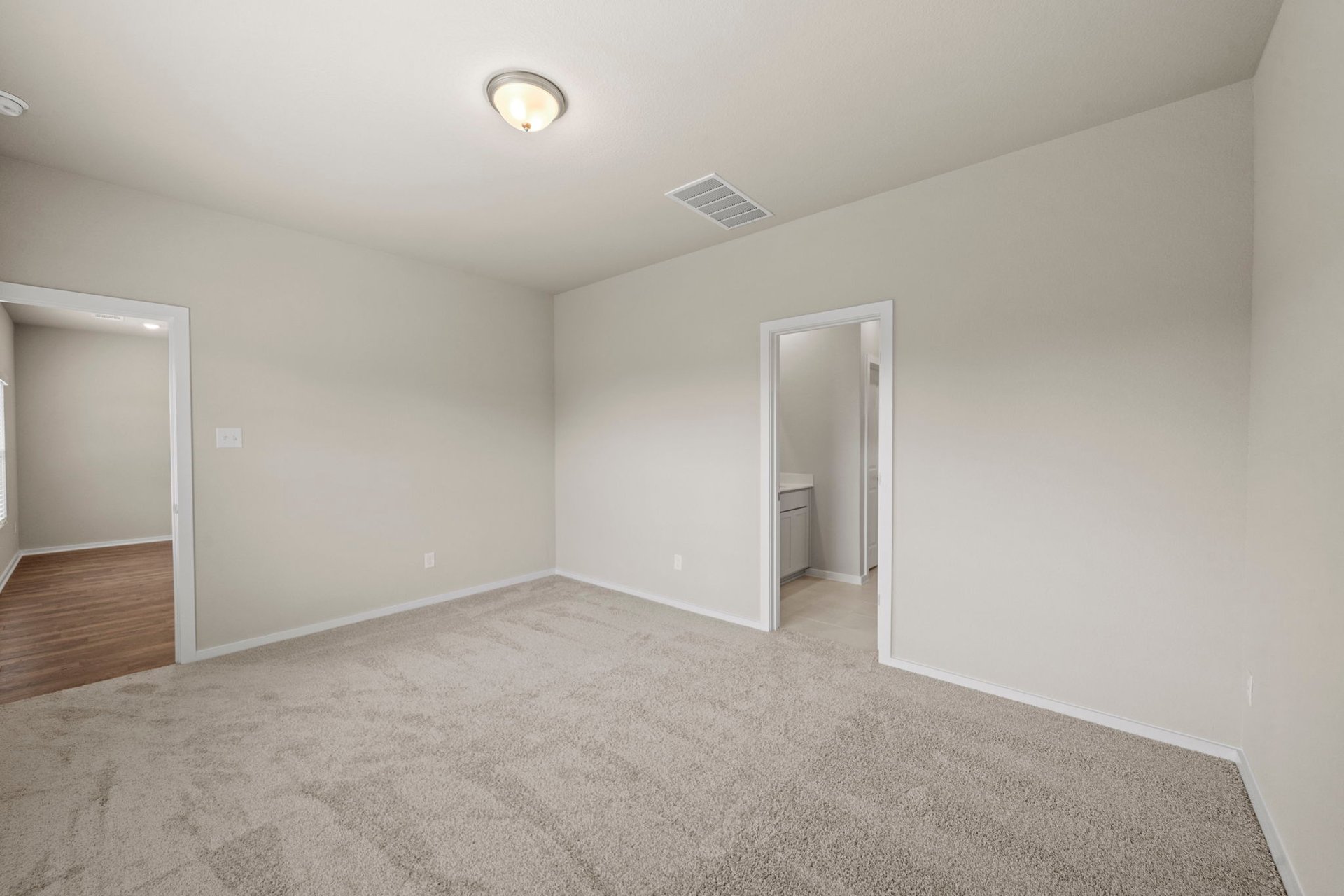144 Wind Hill Jarrell, TX 76537 - Photo 18 of 26 Primary Bedroom