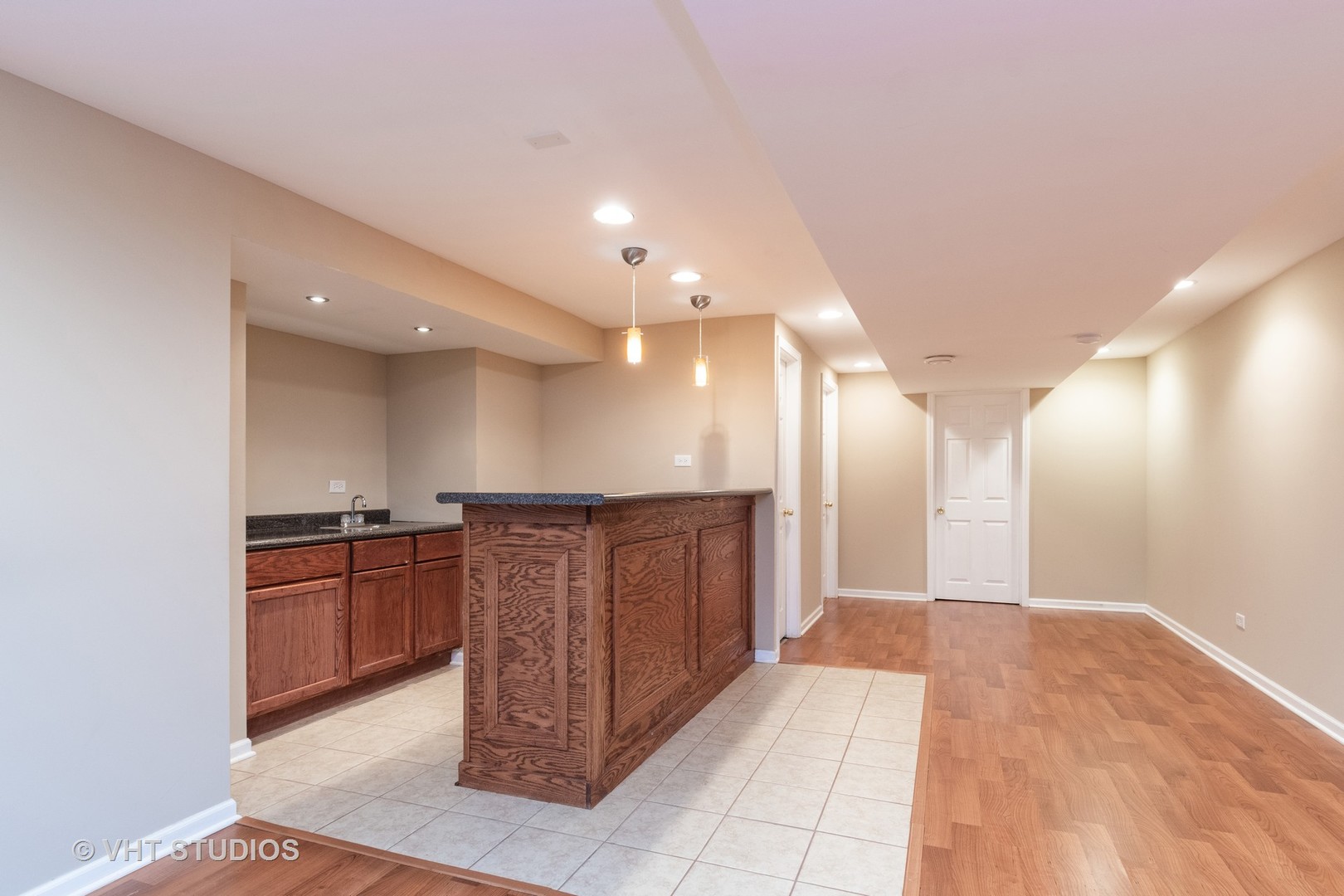 2215 Snow Creek Road Naperville, IL 60564 - Photo 13 of 18 a large hall with stainless steel appliances wooden cabinets and a stove top oven