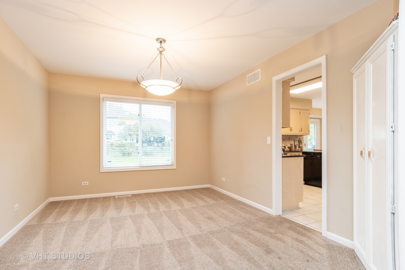 2215 Snow Creek Road Naperville, IL 60564 - Photo 3 of 18 a view of an empty room with a window