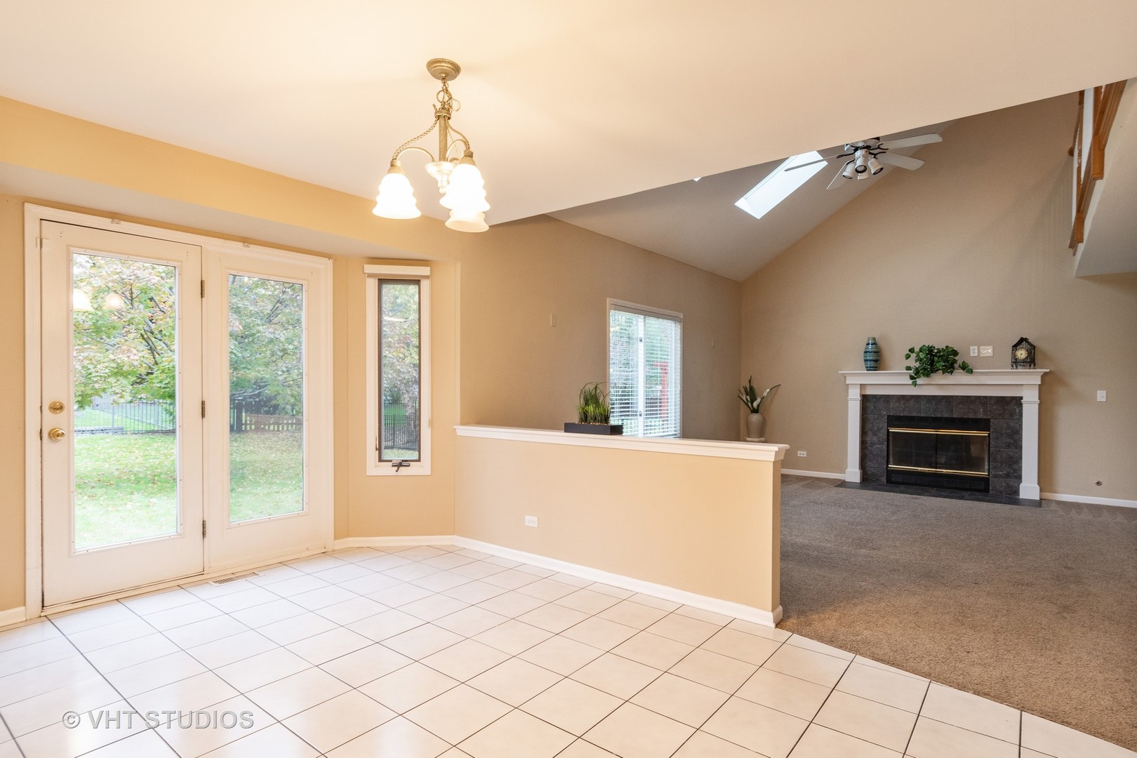 2215 Snow Creek Road Naperville, IL 60564 - Photo 5 of 18 a view of a big room with windows and cabinet