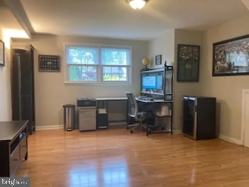 a workspace with furniture and window