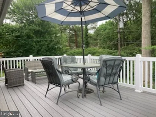 a view of a patio on the deck and a patio