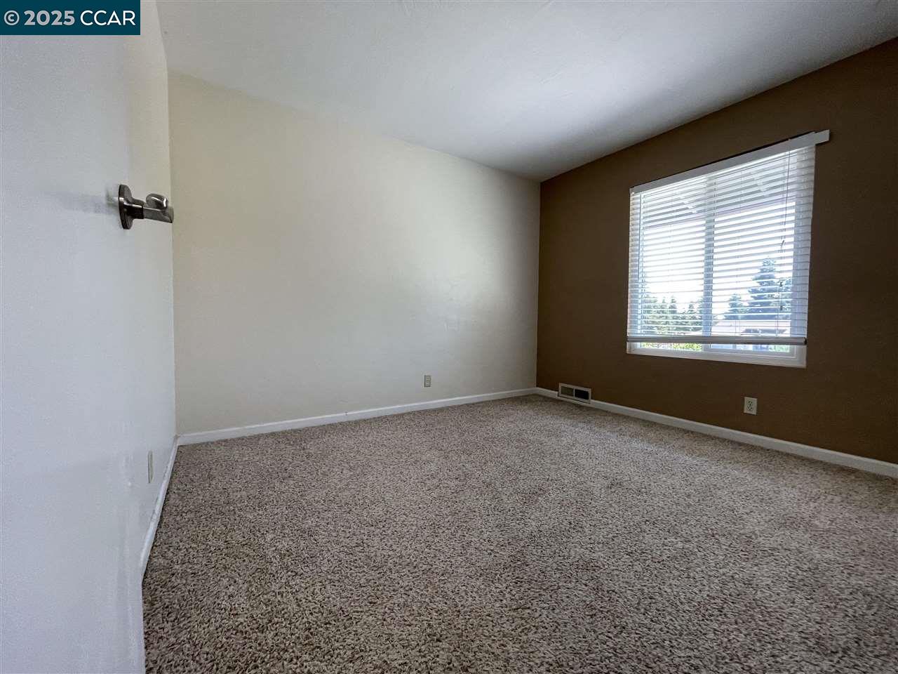 62 Villa Circle Fairfield, CA 94533 - Photo 7 of 10 an empty room with windows