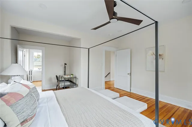 a reading room with furniture and a window