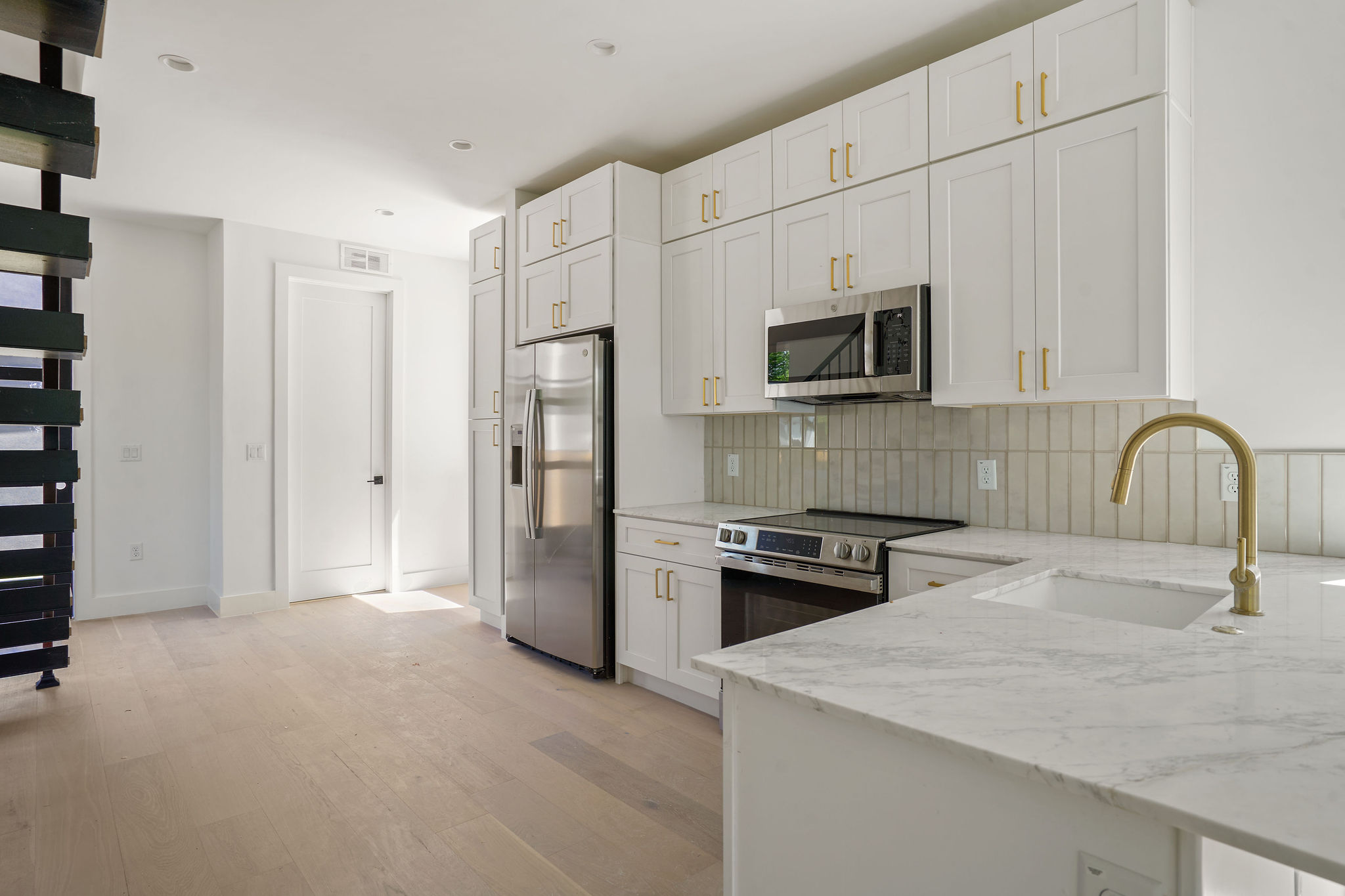 2609 Davis Lane, Unit 2 Austin, TX 78748 - Photo 12 of 23 a kitchen with a refrigerator stove and sink