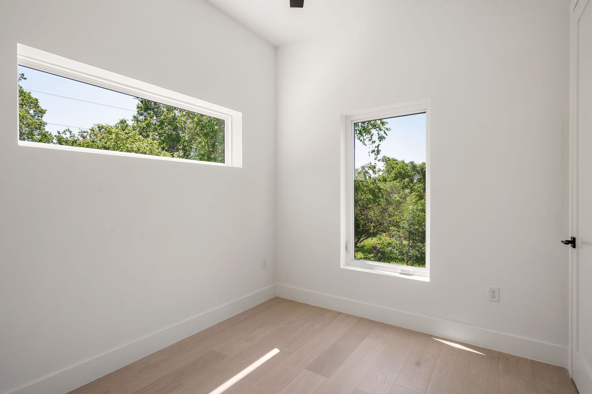 2609 Davis Lane, Unit 2 Austin, TX 78748 - Photo 14 of 23 an empty room with a window