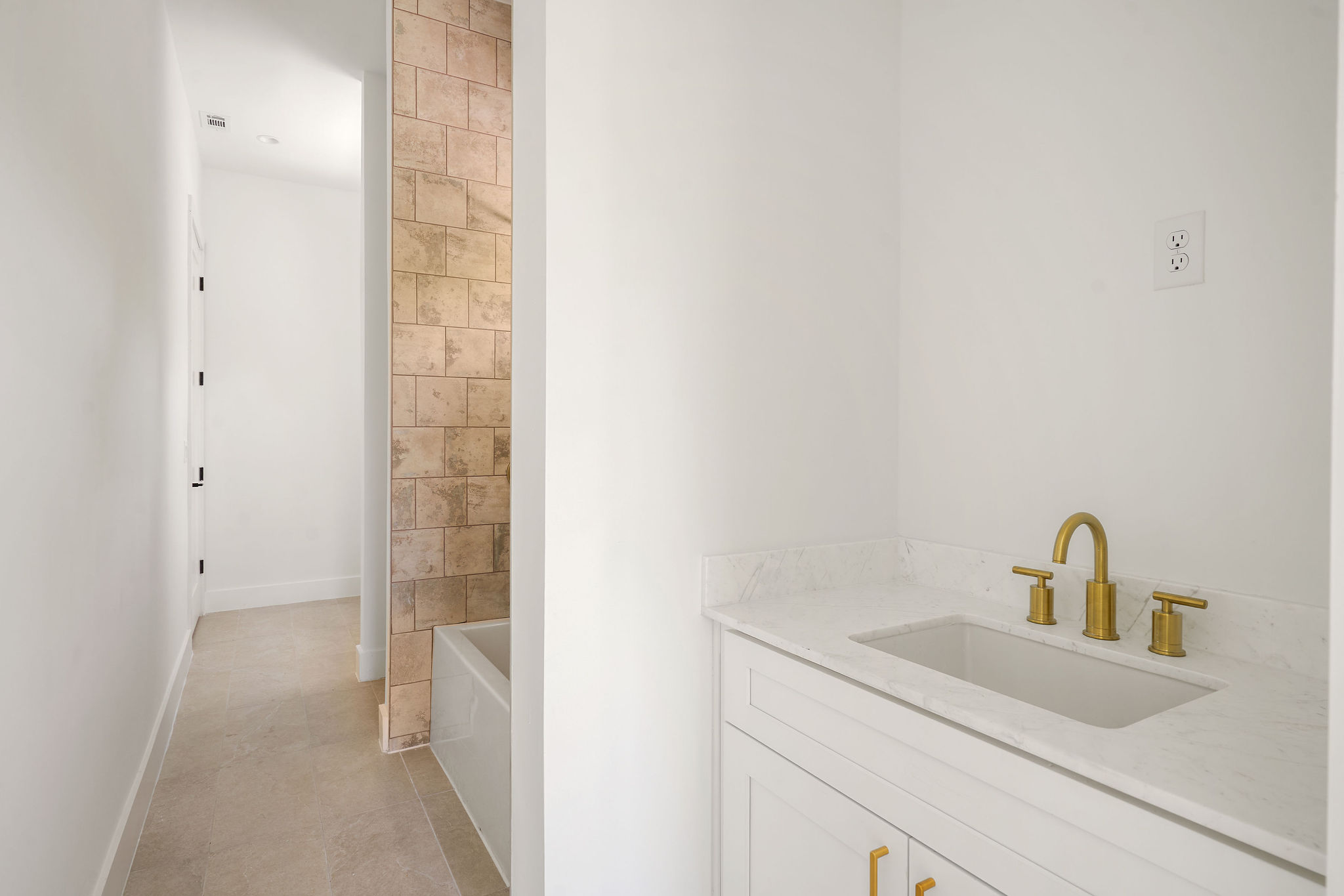 2609 Davis Lane, Unit 2 Austin, TX 78748 - Photo 15 of 23 a bathroom with a sink and mirror