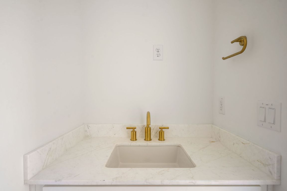 2609 Davis Lane, Unit 2 Austin, TX 78748 - Photo 16 of 23 a bathroom with a sink and vanity