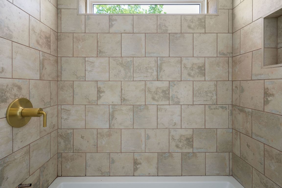 2609 Davis Lane, Unit 2 Austin, TX 78748 - Photo 17 of 23 a bathroom with a shower