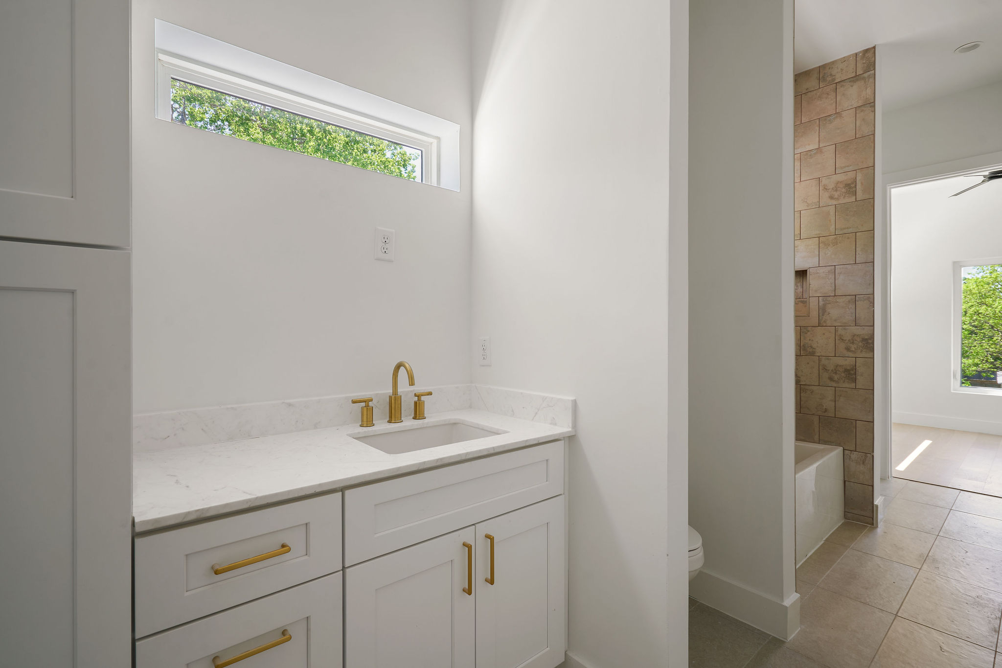 2609 Davis Lane, Unit 2 Austin, TX 78748 - Photo 19 of 23 a bathroom with a sink and a mirror